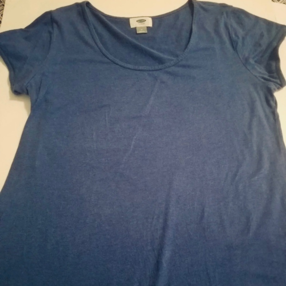 We are selling a girls navy blue shirt.